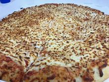 Looks and tastes like the Costco Pizza we get at home.