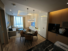 1-bd Suite - Living Room + Kitchen