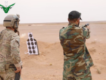 A member of the MaghaweirThowra faction and a member of the United States Special Forces Unit at  al-Tanf base.