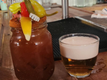Bloody Caesar with lager back. On the other side of the Caesar is an unexpected shrimp!