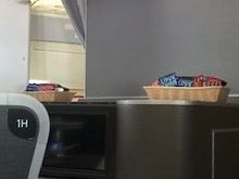 Snack baskets placed at the front of the J cabin and walk up snack bar after breakfast