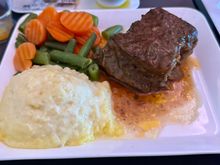 Beef was good and tender, polenta was very good, veggies were flavorless out of a can