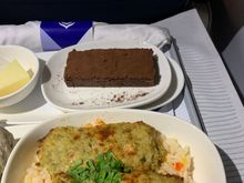 Chicken kebab with rice, chocolate cake. So delicious