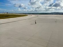 Standard friendly JAL wing walker escort and wave off