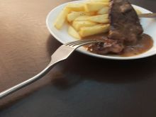 Steak and chips made to order from Priority Pass Lounge Brisbane international airport 
