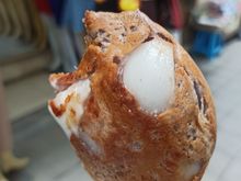 "ba bin," aka a grilled crunchy creamy coconut pastry