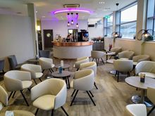 Typical business lounge seating area, although the circular food and drink area was well designed