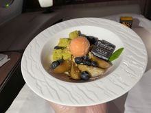 Balsamic poached peach and roasted nut brownie.