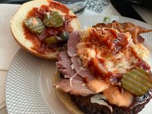 Not the most inspiring food.  Tried the NY burger, it want great but just ok.  Unfortunately he chucked on BBQ sauce and I had to ask for the thousand island 