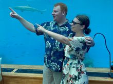 Silly pose trying to point to a shark