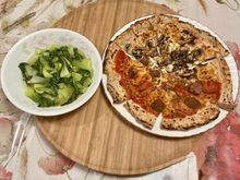 Some of the pizza with bakchoy
