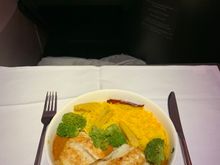 Spiced curried branzino with saffron basmati rice and vegetables 