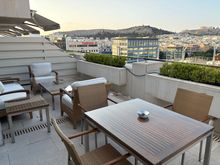 And fortunately smokers are still welcome! The table is sturdy for a meal or composing work notes,