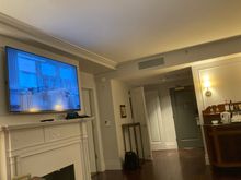 A huge Philips TV and lovely mantle piece ...... word of warning the airconditioning works extremely well .... especially for our American friends who like to wake up with icicles hanging down their noses and prefer the livingroom to feel like a freezer !