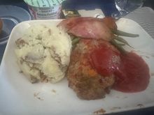 Had the Denver signature bison meatloaf today DEN-YEG.  As someone who doesn’t normally like meat loaf I was impressed.   Pretty decent flavor and moisture; definitely not the dry stuff I grew up hating.  The mash was also decent.  Beans were average and the bacon was similar to what you’d get at a lower tier hotel buffet; no crisp whatsoever, but at least not too fatty/chewy.  