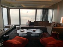 Sofa/living room area with the view of Hong Kong harbor