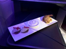 Snack platter selection (poached codfish, panko coated crab cake stuffed with shrimp)