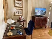 Upon entry directly to the left