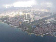 Old IST seen through a gap between rain showers on approach to new IST. Note all the Covid-parked TK aircraft.