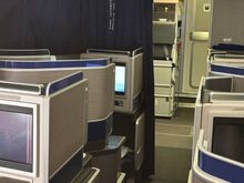 Note the curtain around seat 1A - used for pilot rest.