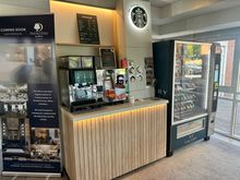New small (self serve) coffee shop by entrance