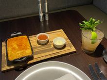 Cornbread and the Navy Fog cocktail, both excellent.