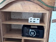 Again the modern safe is hiding in an antique cupboard