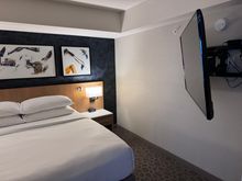 Bedroom with large tv