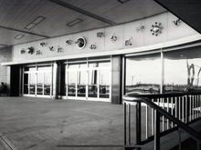 The original location of the sculpture on the facade of the 1956 terminal. 