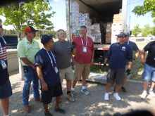 Unloading supplies from their truck