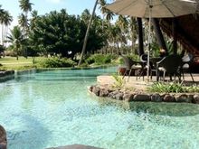 A view across the lagoon pool to the Pool Bar