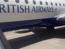 Close up of the BA E190 at Granada airport in June 2014.