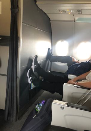 2 minutes into boarding. The CSM has at least now told the man to put his shoes back on!