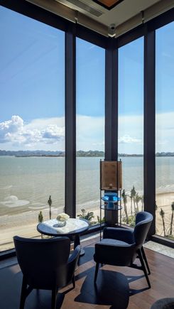 Floor to ceiling windows with view of the bay