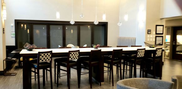 Breakfast room taken at afternoon arrival, business center off to the right. 
