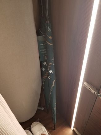 Two large branded umbrellas