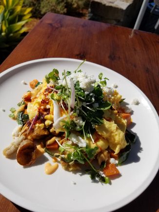 Roasted chicken hash - hearty breakfast choice, seen here with scrambled eggs