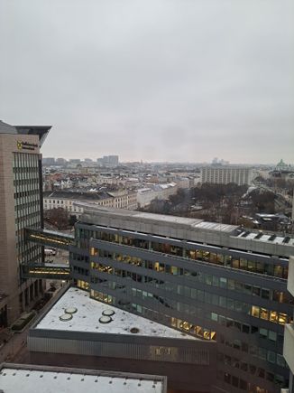 View from Rm 1231 Hilton Vienna Park. Part of Stadtpark visible, intetcontinental hotel in the middle, Karlskirche to the right (beautiful it up at night) and the Dome of the Belvedere to the left 