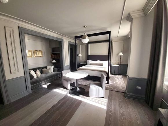 Junior Suite, note seating area, and table with hole in it