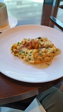 The executive lounge scrambled eggs and sea urchin ( tasty if a little salty) ( also had the lobster omelet in Cerise a little earlier!)