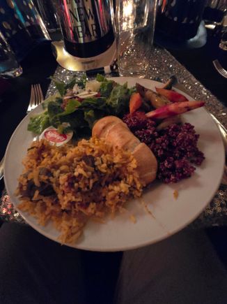 The first station offered bread, salad, vegetables, lamb biryani, and various meats that I will come back for.