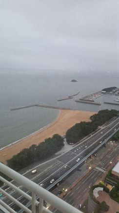 View of the bay and beach. Weather was overcast and cool ( cool enough for a jumper). 