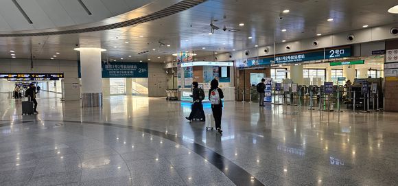 Exit 2 from the Maglev might be best?  I exited the other side of the building.
Sign for the Holiday Inn.
