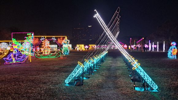 Samurai swords illuminations at Illuminage.  Doubletree hotel in the distance
