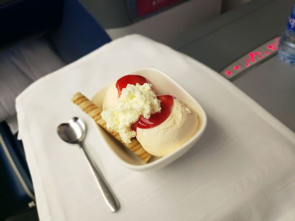 Vanilla Ice Cream Sundae with your choice of sauces, nuts, and whipped cream (strawberry and whipped cream for me)