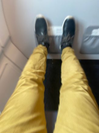 When I sit back right there is 1-2cm left for my feet between the bulkhead.