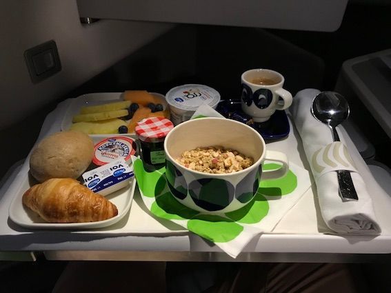 Before landing, I opted for light breakfast. It included yoghurt, granola, fresh fruits and blueberries, croissant with strawberry jam and bread roll. In addition to instant coffee, espresso and cappuccino was also available. American breakfast with omelette and sausage was also available and so was a Chinese one which was noodles.