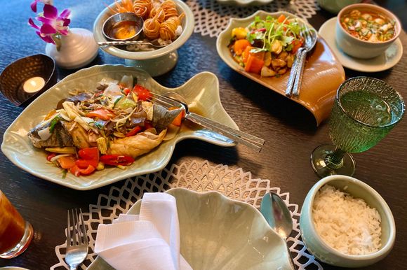Deep fried seabass , sweet and sour pork , tom yum kung ..