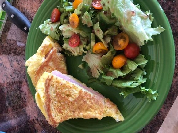 There was a discussion of a failed attempt at an egg sandwich in the vent thread. I made one today, added a little ham and a salad. 