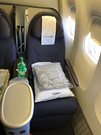 Home for the next 5.5 hours. Very pleased to see that United is still using Saks Fifth Avenue Bedding. Some of the most comfortable pillows in the sky. 